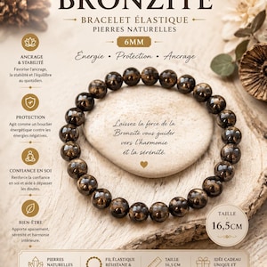 Op de afbeelding: Een Bronzite elastische armband met natuurstenen, 6 mm groot. De armband wordt gepresenteerd op een lichtgekleurd oppervlak met de tekst "Energie, Protection, Ancrage". De armband is 16,5 cm groot.