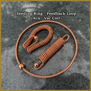 May include: A copper Seeding Ring - Feedback Loop Acu - Vac Coil set featuring a large circular twisted wire ring with a spherical bead, a U-shaped twisted wire component, and a cylindrical twisted wire coil with small spherical end beads.