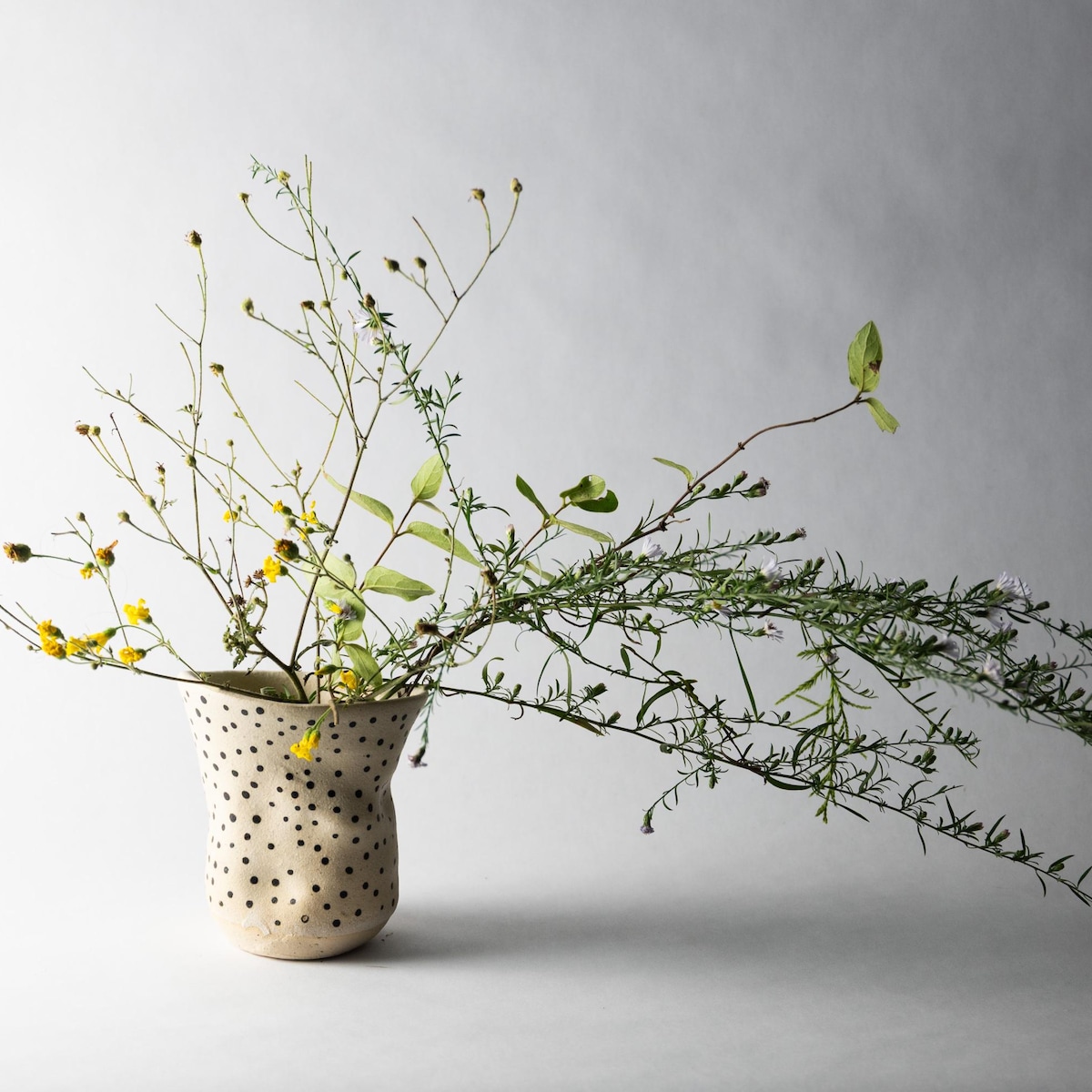 Small asymmetrical polka dot vase