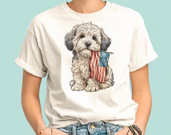 Maglietta con cucciolo che tiene in mano la bandiera americana / Maglietta patriottica per cani
