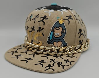 100 snaps versus a gorilla, custom designed snap back hat.