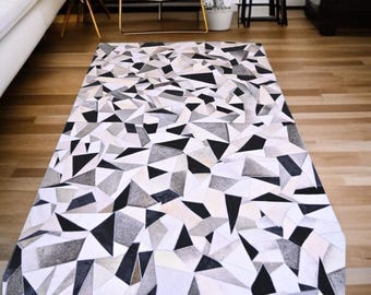 Geometric Cowhide Patchwork Rug: Handmade Hair-on-Hide Area Rug