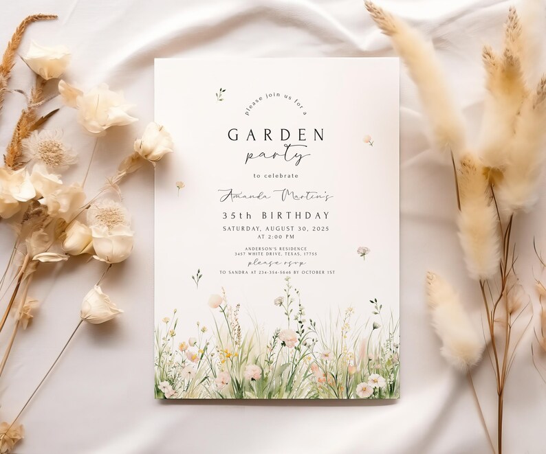May include: A cream-colored invitation with the text "GARDEN party" and event details. The invitation features floral illustrations at the bottom and is surrounded by dried flowers. The text includes the name Amanda Martin's, the date, time, and location.