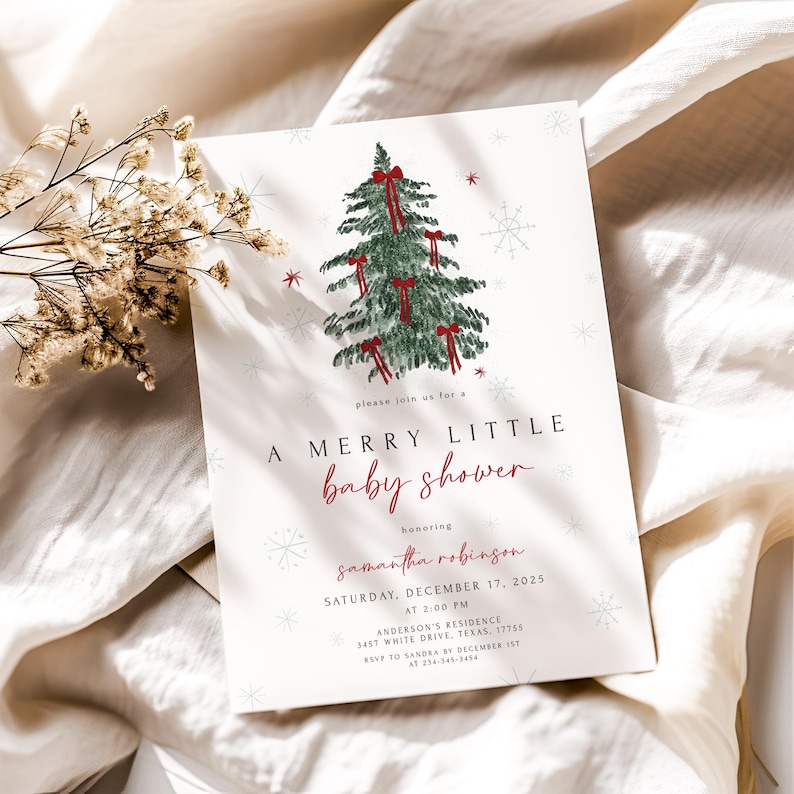 May include: A baby shower invitation with a Christmas theme. The invitation features a green Christmas tree decorated with red bows and snowflakes. The text reads "A Merry Little Baby Shower".