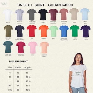 Puede incluir: Una variedad de camisetas unisex Gildan 64000 en varios colores, incluyendo blanco, negro, rojo y azul. La imagen tambi&eacute;n incluye una tabla de tallas con medidas en cent&iacute;metros, que van de la S a la 2XL.