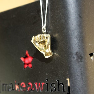 Fist pendant, power symbol charm, fist jewelry, hand jesture jewelry, bronze,  handmade,