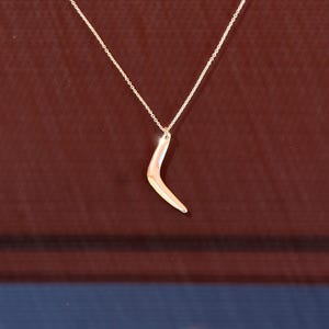Boomerang Pendant Necklace: Unique Symbol of Adventure and Return, hand made, sterling silver,