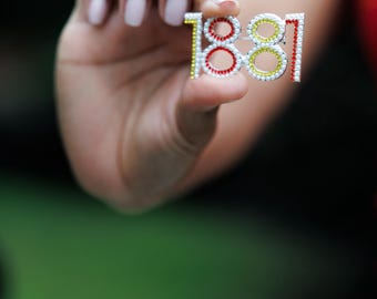 Pin de solapa de piedra de cristal TU de 1881
