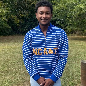 North Carolina A&T University Striped Zip-Up Sweatshirt (Unisex)