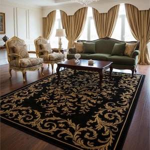 May include: A black area rug with a gold floral pattern dominates a living room scene. The rug is centered beneath a dark wood coffee table and a green sofa. Two ornate armchairs and gold curtains frame the windows, creating a luxurious atmosphere.