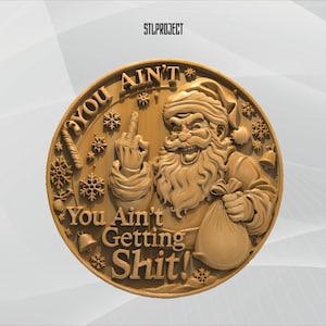 May include: A circular, gold-colored relief sculpture featuring Santa Claus giving the middle finger. The text "YOU AIN'T GETTING SHIT!" is carved around the image, along with snowflakes and a bell. The text "STLPROJECT" is at the top.