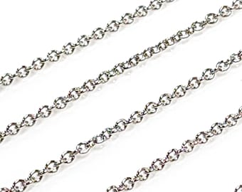 May include: A silver chain necklace with a delicate, cable chain design. The chain is shown in multiple lengths, allowing for a variety of styling options.