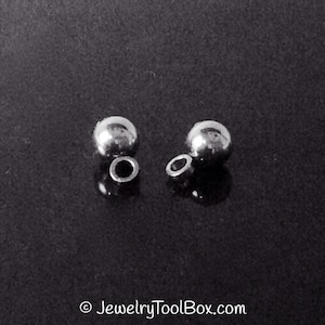 Colgantes redondos de metal, bola de 5 mm, dijes de acero inoxidable, argolla de 2 mm, hipoalergénicos, no se deslustran, lote de 25 a 100 unidades #1460 imagen 2