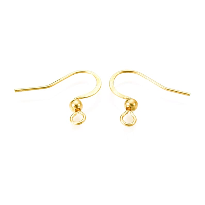 May include: Two gold-toned earring hooks with a small ball at the top and a loop at the bottom.