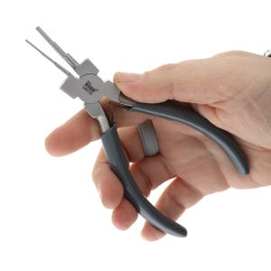 May include: A pair of Bead Smith pliers with gray handles and a silver metal head. The pliers are designed for jewelry making and feature a rounded tip for shaping wire. The brand name is visible on the head of the pliers.