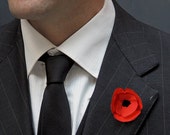 Red poppy lapel pin