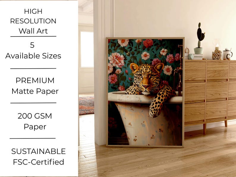 May include: Framed wall art featuring a leopard in a bathtub, set against a floral wallpaper backdrop. The artwork includes the text "HIGH RESOLUTION Wall Art" and "5 Available Sizes". The print is on premium matte paper, 200 GSM, and FSC-Certified.
