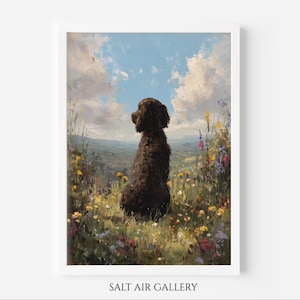 May include: A framed art print depicting a brown dog in a field of wildflowers, looking towards a blue sky with white clouds. The painting has a painterly style with visible brushstrokes and a soft colour palette. The text "SALT AIR GALLERY" is at the bottom.
