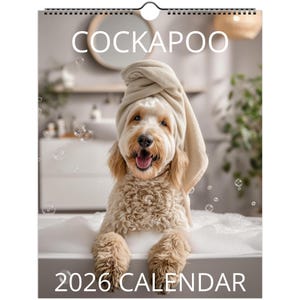 May include: A 2026 calendar featuring a Cockapoo dog in a bathroom setting. The dog is wearing a towel on its head and is in a bathtub filled with bubbles. The word "COCKAPOO" is at the top, and "2026 CALENDAR" is at the bottom.