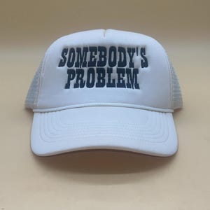 Somebody&#39;s Problem Trucker Hat