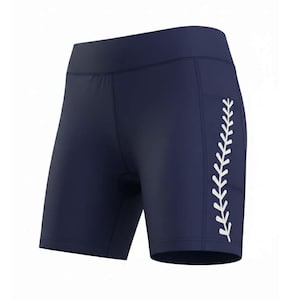 May include: Navy blue athletic shorts with a high waistband. A white, stylized baseball stitch design runs vertically along the right side. These shorts are designed for athletic activities and provide a comfortable fit.