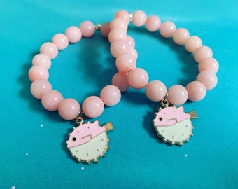Pulsera elástica de pescado de hojaldre rosa