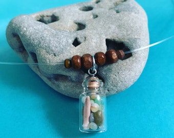 Tiny Glass Bottle of Sea Urchin Spines and Glass Pebbles Invisible Necklace