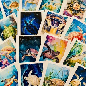 May include: A collection of watercolor art prints featuring sea turtles in various underwater scenes. The prints showcase turtles in shades of green, brown, and blue, swimming amidst coral reefs and starry backgrounds. The art style is detailed and vibrant.