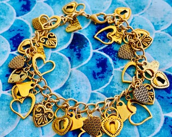 A lot of Hearts Gold Tone Charm Bracelet Adjustable length 8.5 inches