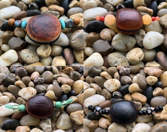 Collar invisible de habas marinas con forma de hamburguesa