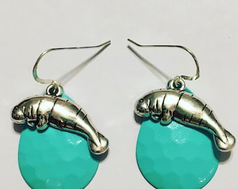 Pendientes de cuchara de manatí