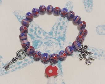 Pulsera elástica de oso danzaro rojo, blanco y azul