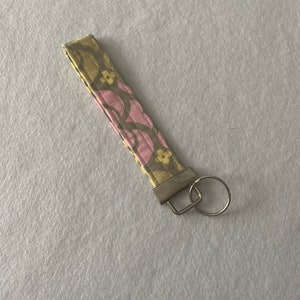 Gray, Pink, and Yellow Key Fob