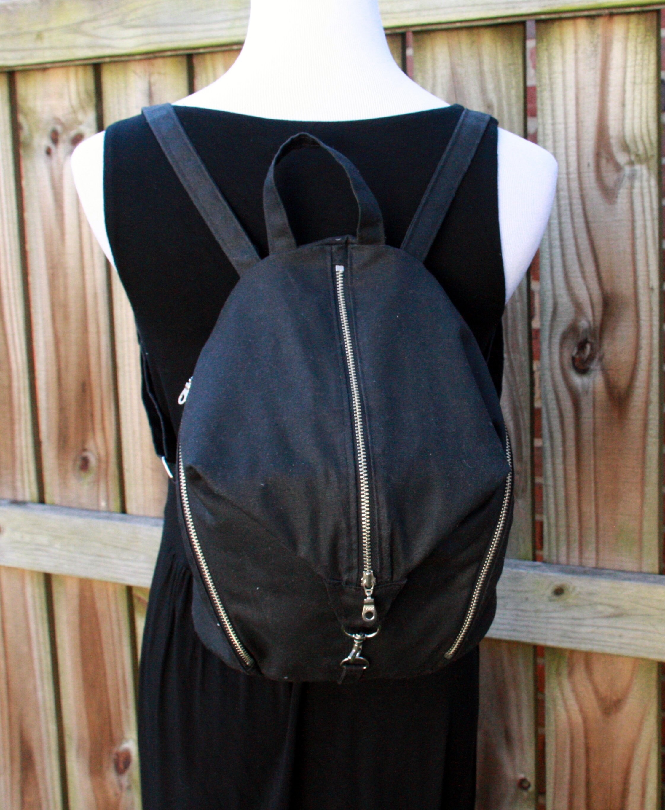 black waxed canvas backpack