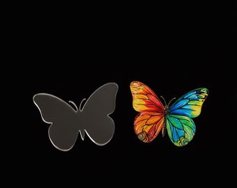 May include: Two butterfly designs against a black backdrop. One is a clear, mirrored silhouette. The other is a vibrant butterfly with orange, red, yellow, green, and blue wings, featuring detailed patterns.
