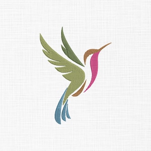 May include: An embroidered hummingbird design in flight, featuring a stylized, colorful pattern. The bird's wings are olive green, the body is pink and brown, and the tail is blue. The design is set against a white, textured background.