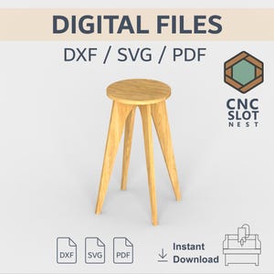 Puede incluir: Un taburete de madera clara con un asiento redondo y tres patas anguladas. La imagen incluye el texto "DIGITAL FILES DXF / SVG / PDF" y "CNC SLOT NEST". También hay iconos para archivos DXF, SVG y PDF, junto con "Instant Download".