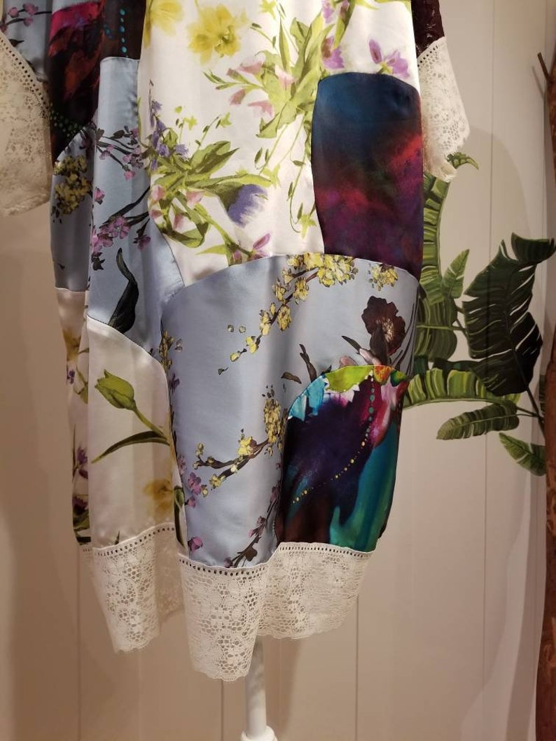 Feel a luxurious countryside nostalgia as your eyes cascade over the layers of silk in this fully reversible tunic. Mixed silk floral prints, lace panels and vintage lace. Feel delighted + very loved when you slip her on!