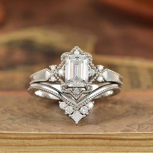 Emerald Cut Moissanite Bridal Set: Art Deco Halo Ring with Chevron Band