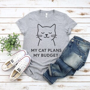Funny Cat Shirt - My Cat Plans My Budget - Minimalist Cat Lover Tee - Cute Pet Owner Gift - Cat Mom Cat Dad Shirt