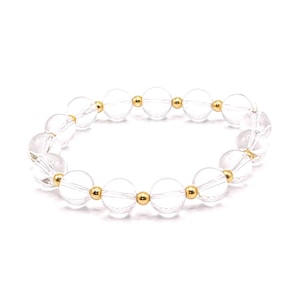 Clear Crystal Bracelet with Gold Spacers, Elastic Stretch Design.