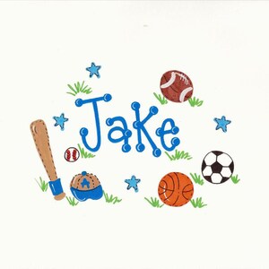 May include: A blue and white personalized name sign with the name "Jake" in blue letters. The sign is decorated with a baseball bat, a baseball, a baseball cap, a basketball, a soccer ball, and stars.