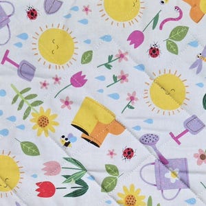 May include: A set of three ceramic mugs with a speckled, matte finish. The mugs are in shades of cream, light brown, and dark brown. Each mug has a simple, minimalist design and a rounded handle.