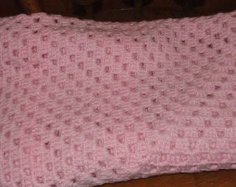 Crocheted pink baby or lap afghan