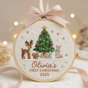 Personalized embroidered woodland animal baby’s first Christmas ornament with custom name and year, perfect keepsake gift for newborn baby boy or girl.