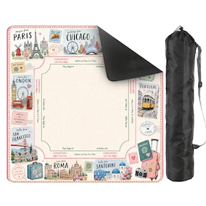 May include: A travel-themed play mat featuring illustrations of famous landmarks from cities like Paris, London, and Rome. The mat has a cream-colored background with pink borders and a black carrying bag.