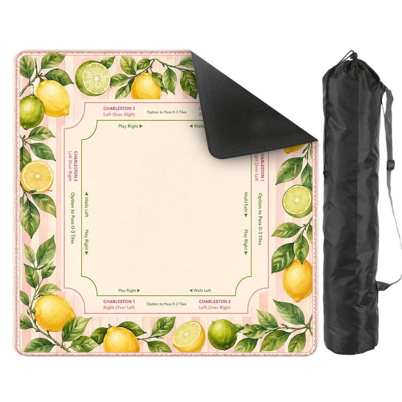 May include: A rectangular game mat with a pink and white striped border, adorned with lemon and lime illustrations. The mat has text that reads "Charleston 2" and "Play Right". A black carrying bag is included.