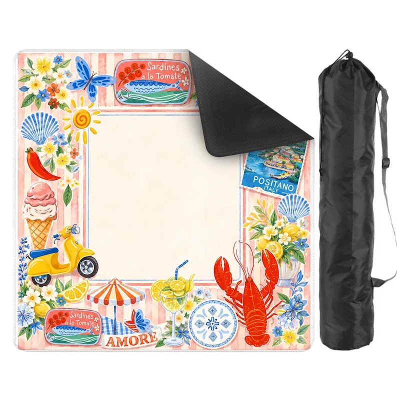 May include: A square picnic blanket with a colorful Italian coastal design. The blanket features illustrations of a yellow scooter, lobster, ice cream, and the text "Sardines a la Tomate" and "Amore". A black carrying bag is included.