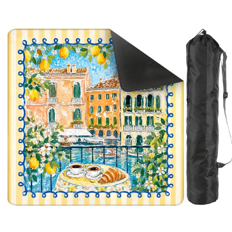May include: A yoga mat with a watercolour painting of a European cityscape, a table set for coffee and a croissant. The mat has a yellow and white striped border and comes with a black carrying bag.