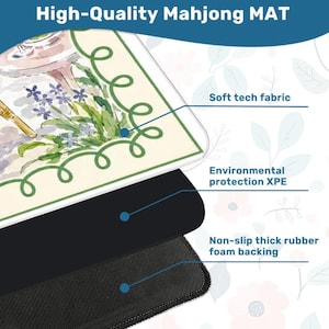 May include: A high-quality Mahjong mat with a floral design and the text "High-Quality Mahjong MAT". The mat features a soft tech fabric, environmental protection XPE, and a non-slip thick rubber foam backing.